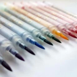 Gourmet Food Pens Full Set Of 12 - Double-Tip Edible Food Colouring Marker Pens + Free Random Design Pen Case -Wilton Shop gourmet food pens full set of 12 double tip edible food colouring marker pens free random design pen case p6766 28371 image