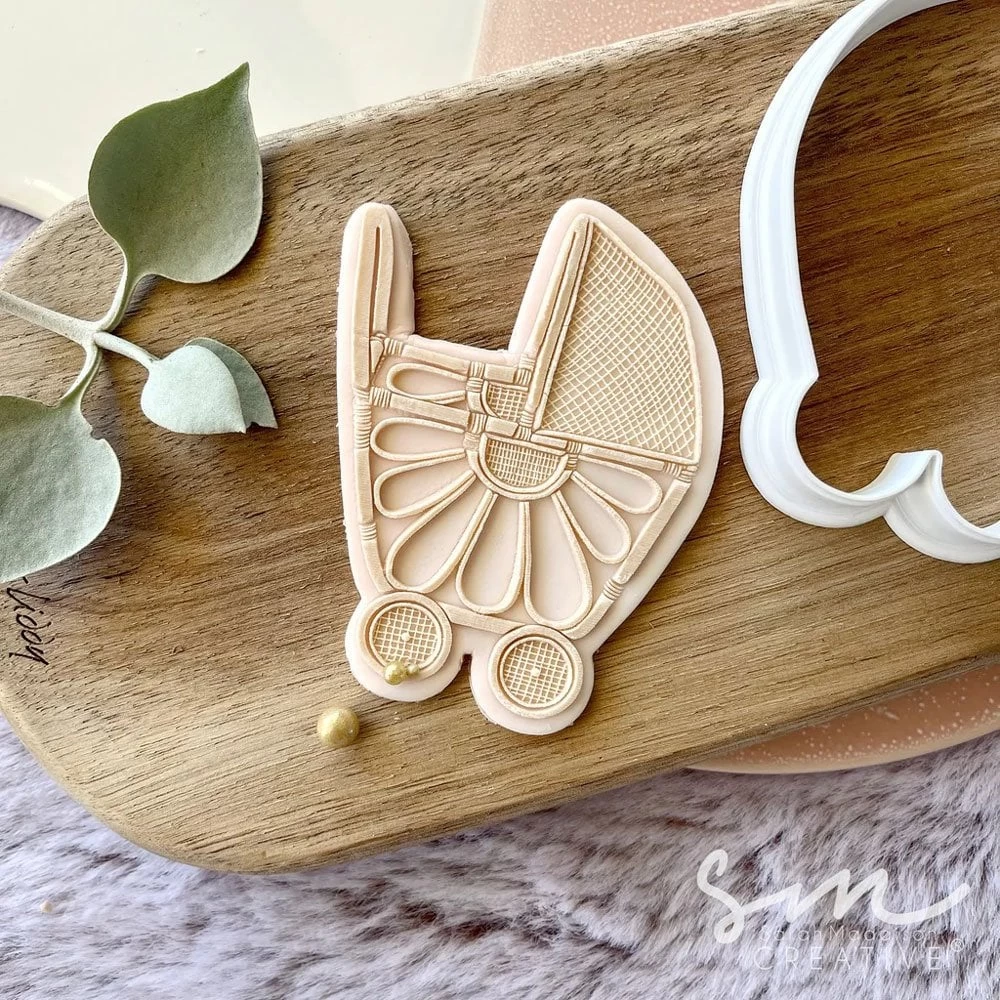 Sarah Maddison Rattan Pram Cookie Stamp & Cutter Sarah Maddison Rattan Pram Cookie Stamp & Cutter -Wilton Shop sarah maddison rattan pram cookie stamp cutter p15775 55028 image