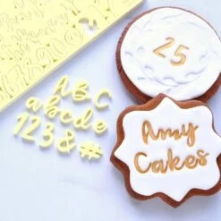 Sweet Stamps By Amy SWEET STAMP Cookie - Uppercase, Lowercase, Numbers & Symbols -Wilton Shop sweet stamps by amy sweet stamp cookie uppercase lowercase numbers symbols p5291 23601 image