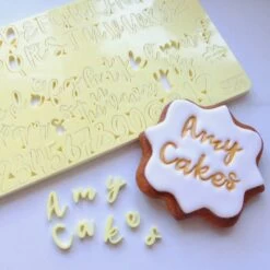 Sweet Stamps By Amy SWEET STAMP Cookie - Uppercase, Lowercase, Numbers & Symbols -Wilton Shop sweet stamps by amy sweet stamp cookie uppercase lowercase numbers symbols p5291 23602 image